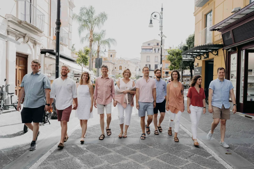 Group Photoshoot in Sorrento – Amalfi Coast Family & Friends Session Group photoshoot in Sorrento Italy with family walking through town street